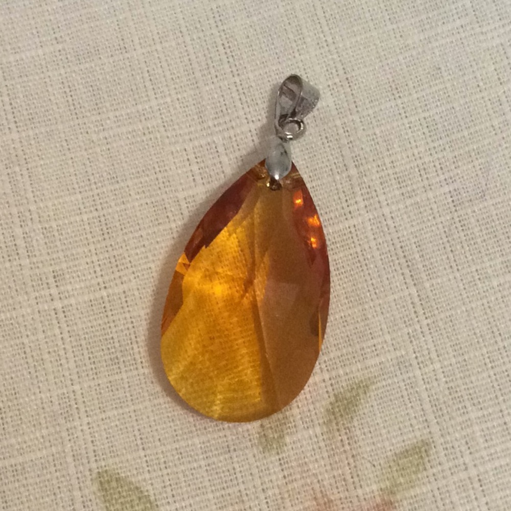 Yellow/brown crystal charm pendant